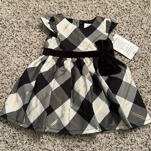 NWT black white and gold newborn party dress.